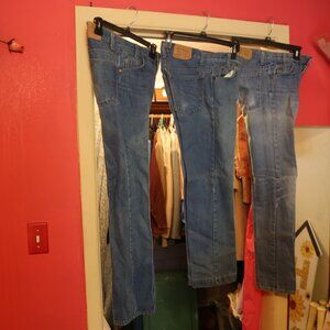 3 levi strauss & co. blue jeans 2 are 28x33 and 1 27x32